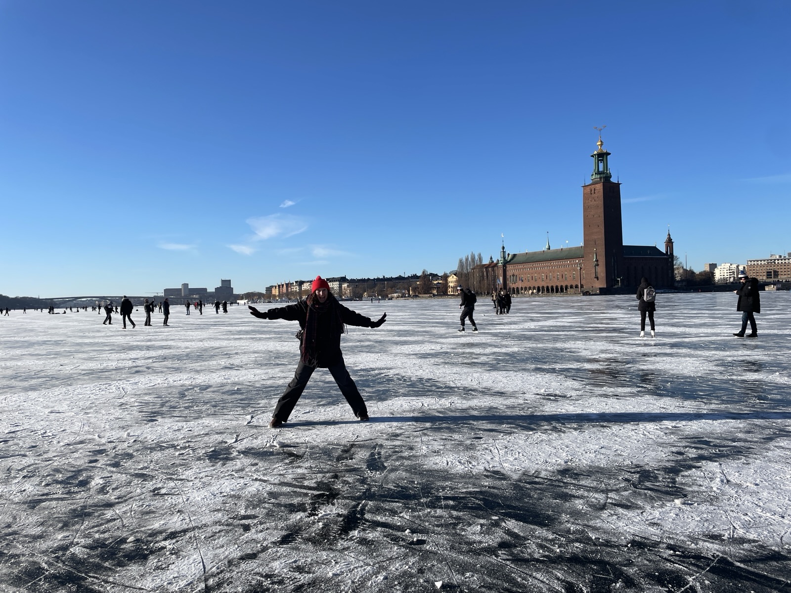 Standing on the ice in front of Stockholm City Hall.